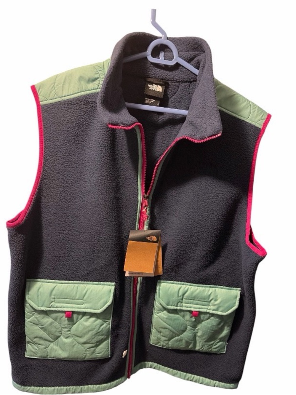 The North Face Charcoal Fleece Vest with Mint Green Pockets and Pink Trim